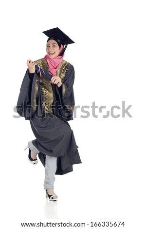 Happy graduate asian muslim student with diploma isolated on white