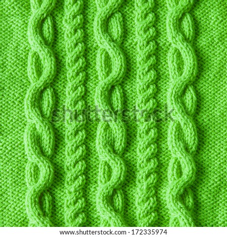 Handmade green knitting wool texture background