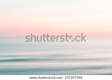 Abstract sunset sky and  ocean nature background with blurred panning motion.