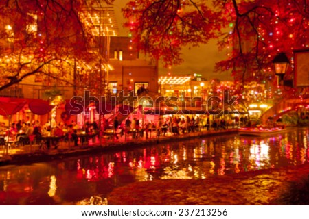 Blurred holiday background. River walk  in San Antonio city at night in Christmas season, Texas, USA