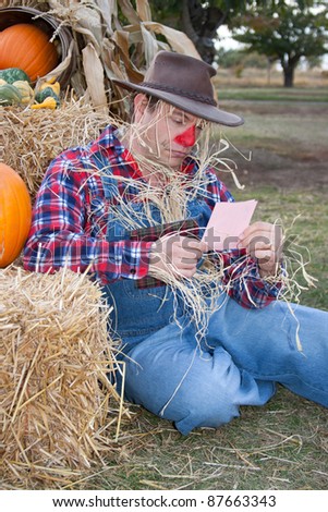 scarecrow with pink slip