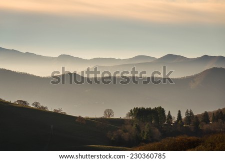 A typical misty sunrise on many mountain farms in the Southern Blue Ridge Mountains of North Carolina.