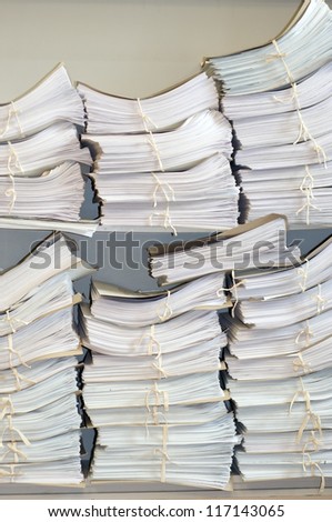 Documents folder on a shelf.