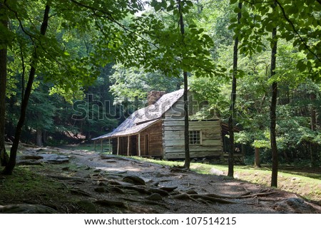 Old log cabin home, in Cades Cove, Great Smoky Mountains, Tennessee, a vacation destination, tourism