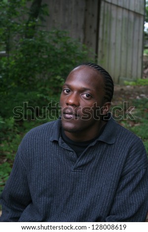Handsome African American man outside looking left