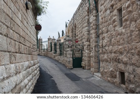 Passageway with ancient stone walls on both side, from the Holy City of Jerusalem, Israel
