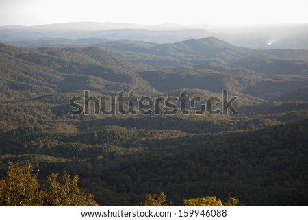 Mountain overview, of distant mountains and valley below