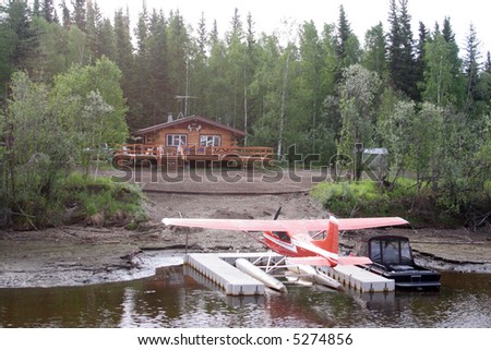 Float plane and home on the river