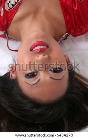 Woman laying down and looking up at the camera