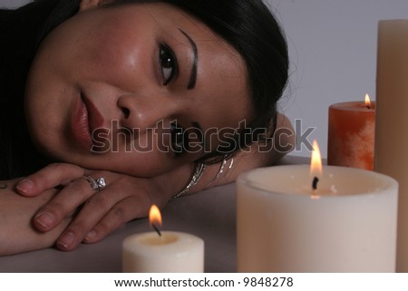 Asian woman with candles