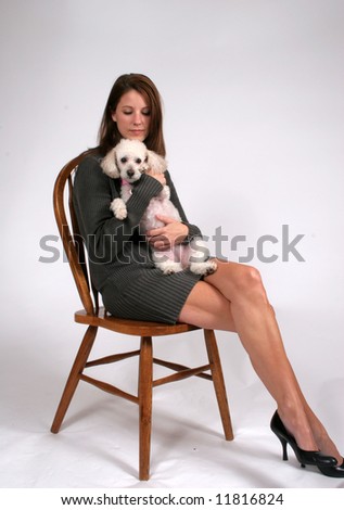 Sexy woman with pet poodle