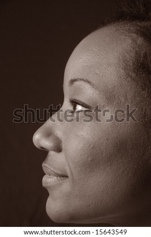 Pretty black woman looking left