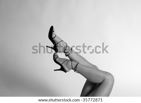 woman\'s legs up in the air