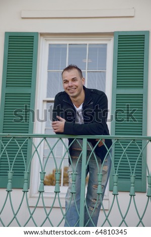 Man leaning on a rail