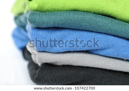 Batch of colorful clothes, folded up washing