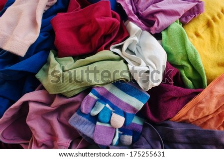 Heap of disarranged colorful clothes