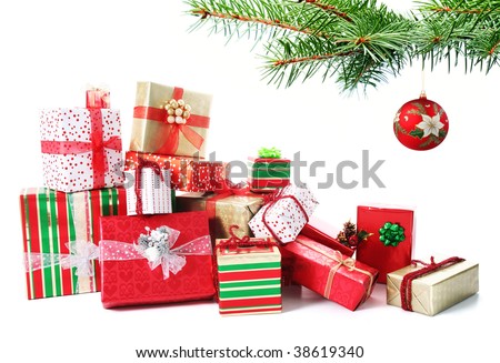 كًٍوًٍلًٍيًٍكًٍشًٍنًٍ رًٍهًٍيًٍبًٍ Stock-photo-a-pile-of-christmas-gifts-in-colorful-wrapping-with-ribbons-under-a-christmas-tree-38619340