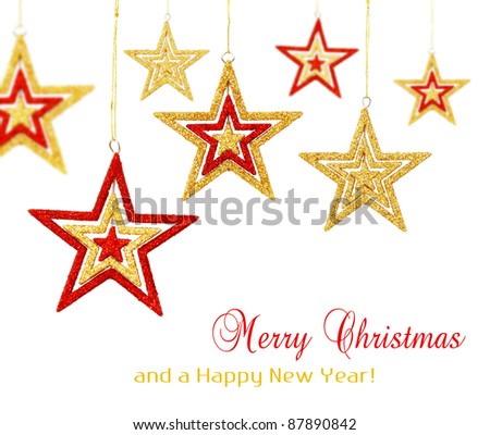 Red and gold Christmas stars ornaments hanging, isolated on white background