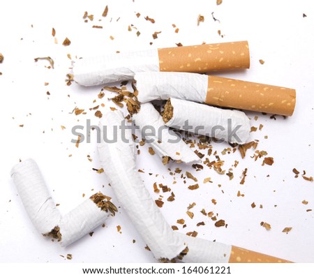 broken cigarettes isolated on white