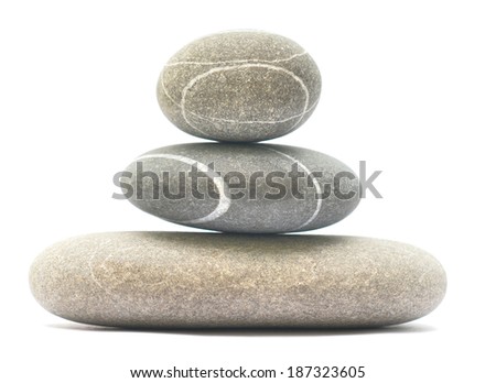 balancing stones isolated on white background