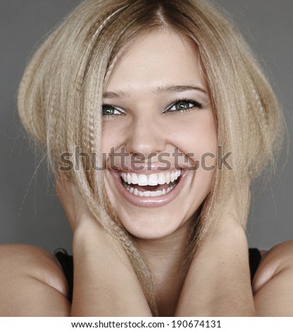 portrait of young laughing woman