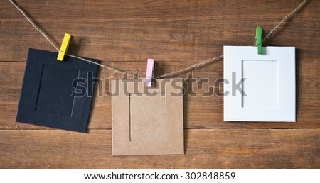 photo frames on wooden background