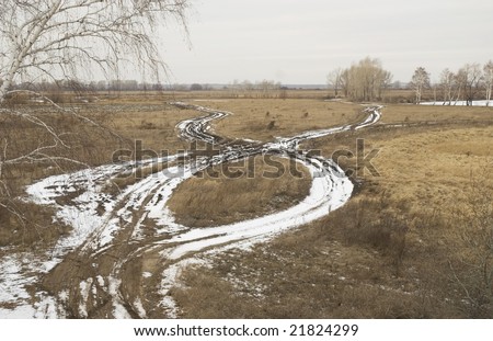 crossroad on a winter field