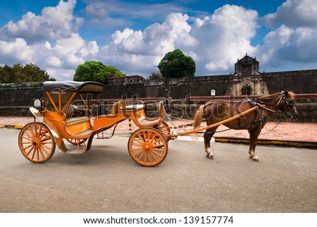 Horse Drawn Carriage Parking In Front Of Fort Santiago.Fort Santiago Is A Citadel Which Was First Built By Spanish Conquistador For The New Established Intramuros City Of Manila , Philippines.