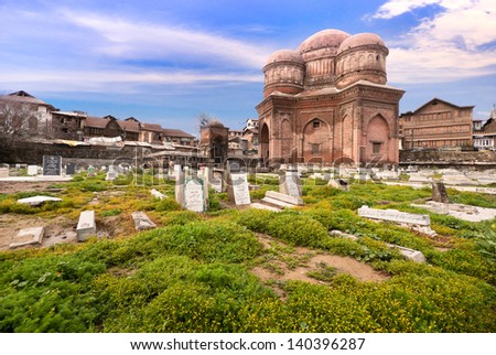 SRINAGAR, INDIA - APRIL 11:Graves surround the Tomb of Budshah is The tomb mother of Sultan Zain-Ul-Abidin , a popular tourist attraction in Srinagar on April 11,2012 in Srinagar,Jammu&Kashmir India.