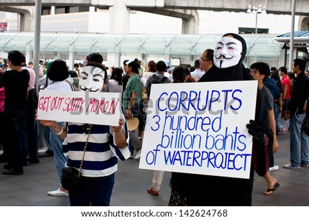 BANGKOK,THAILAND - JUNE16 : Protester showing their slogans during protest against  the Yingluck Shinawatra government at The Bangkok Art and Culture Centre on June16 , 2013 in Bangkok Thailand