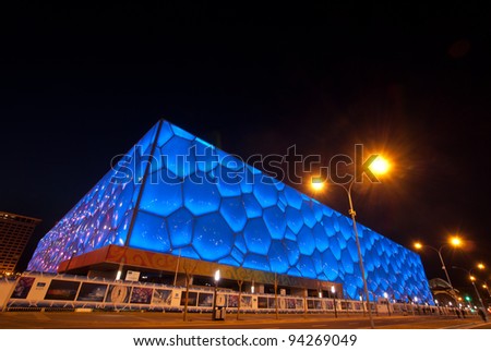 BEIJING, CHINA-APRIL 13 : The Water Cube Stadium built with new material ETFE, symbol of modern China design, glowing at night on April 13,2010 in Beijing, China