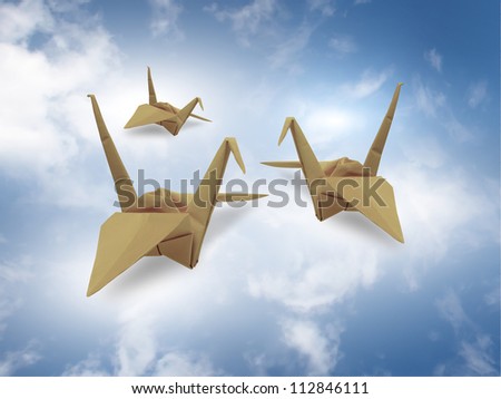 created with the technique of origami bird paper flying in the sky