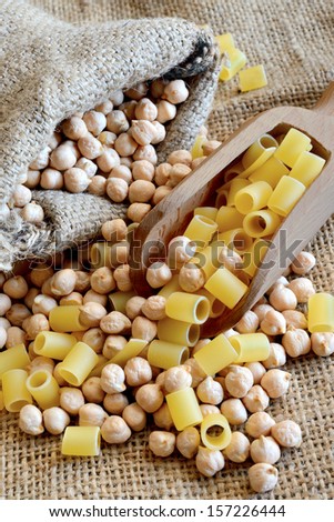 dried white chickpeas ceci on sack and pasta