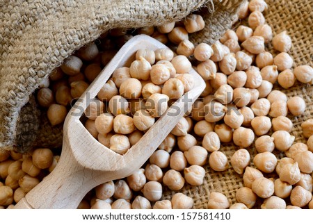 dried white chickpeas ceci on sack close up