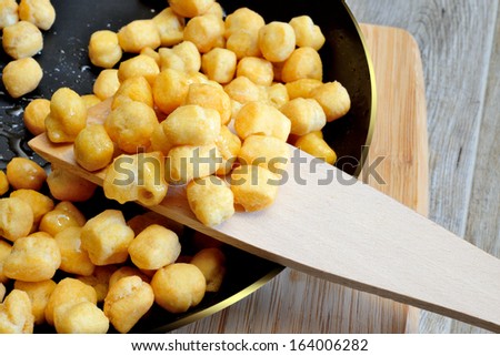 struffoli neapolitan food in Christmas time- fried pastry with honey