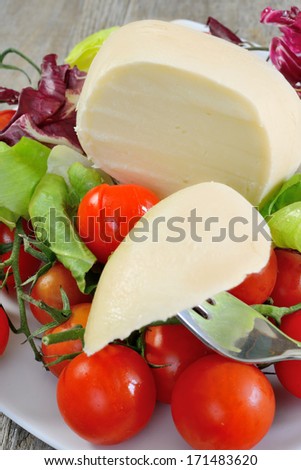 spun paste cheese that smoked cheese with tomatoes