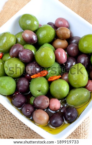 mix olives green and black with olive oil