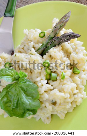 risotto with asparagus decorated with asparagus tips
