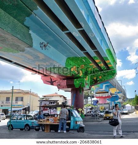 NAPLES,ITALY JULY,23:Mayor has authorized the best writers in the city to paint the metro bridge giving rise to the event \