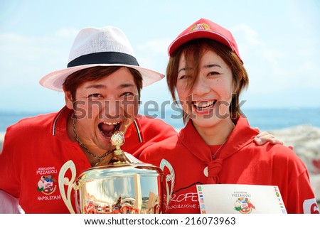 NAPLES - ITALY, SEPTEMBER 4: the 13th edition of the World Championship in 2014 was won by a Japanese pizza, Mayo Ota classic pizza category on september  4, 2014 in Naples IT.