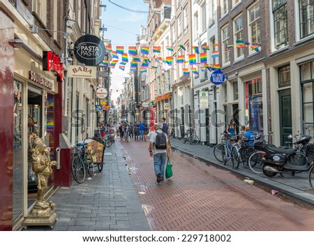 AMSTERDAM, CIRCA AUGUST 2014: red-light district in the early hours of the morning. Every year by about 4 million tourists circa  august 2014 in Amsterdam
