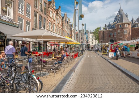 AMSTERDAM, CIRCA AUGUST 2014: Typical landscape with roads and canals of the city center circa  august 2014 in Amsterdam
