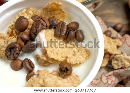 low-fat plain yogurt creamy with crispy cereals and coffee beans