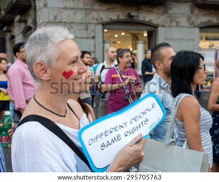 NAPLES, ITALY-JULY 11:Some participants in Gay Pride every year brings together thousands of gay people and not to claim the rights to sexual freedom and against homophobia on  july 11, 2015 in Naples