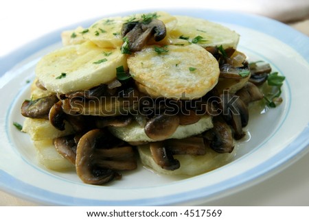 Potatoes with fried mushrooms.