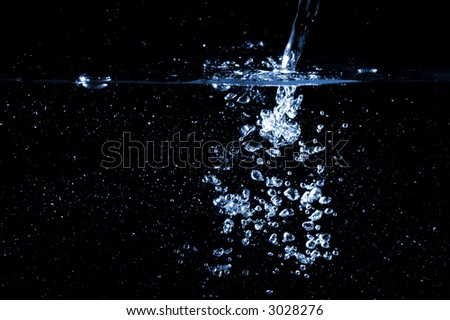 Photo of water splash on a black background.
