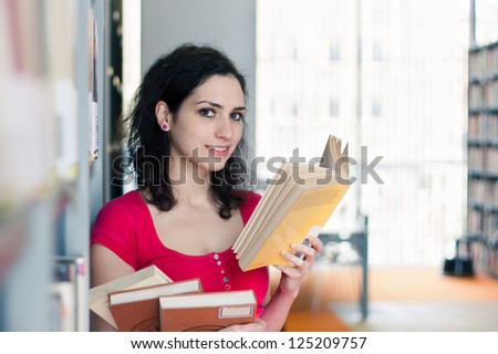 Portrait of a college student in a library