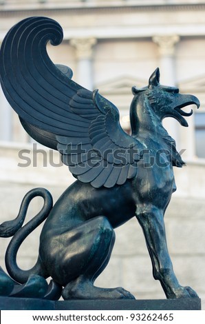 Statue of a griffin in front of the Viennese parliament (Vienna, Austria)
