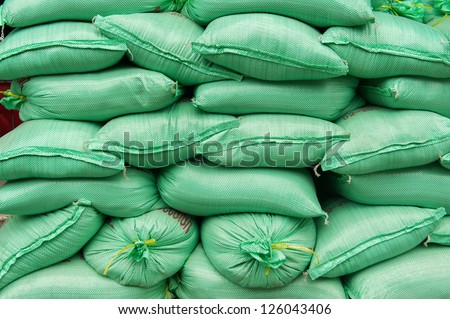 The pile of textured green bags