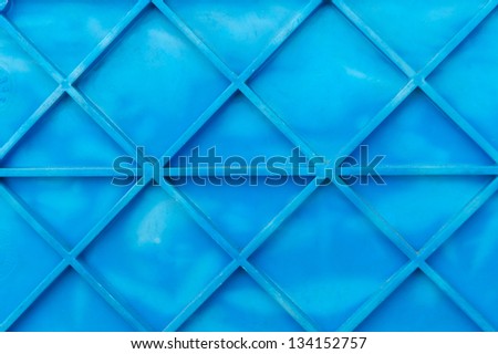 Fragment of blue plastic container